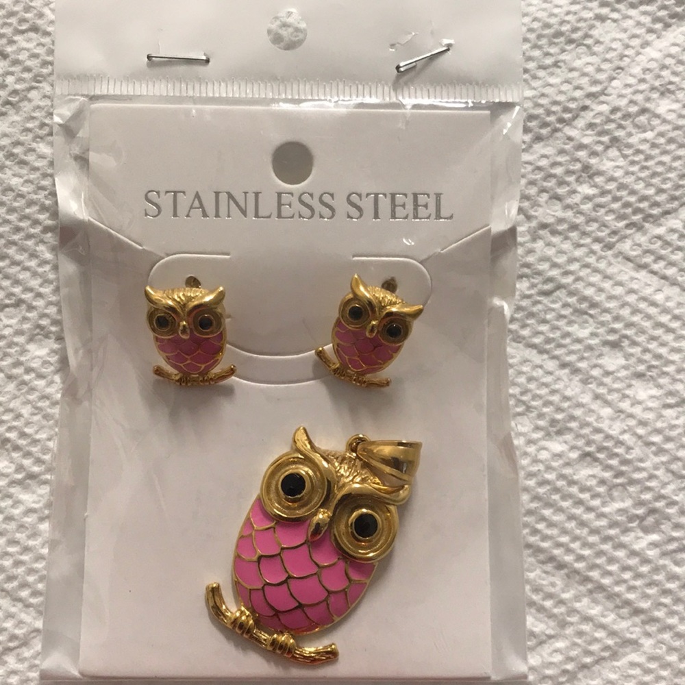Aretes y medalla